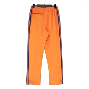 Pantalones para hombres Naranja Hombres Mujeres 1: 1 Alta calidad Púrpura Bordado Mariposa Agujas Track AWGE Pantalones de bolsillo