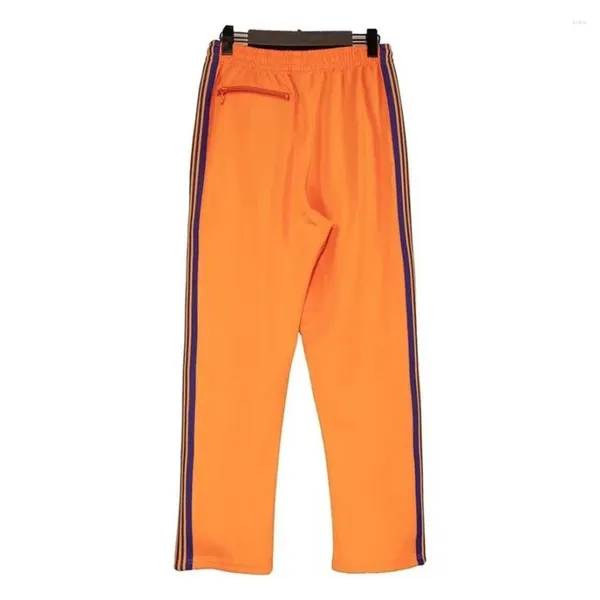 Pantalones para hombres Naranja Hombres Mujeres 1: 1 Alta calidad Púrpura Bordado Mariposa Agujas Track AWGE Pantalones de bolsillo