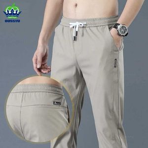 Pantalon masculin Oussyu Nouveau printemps / été hommes décontractés ultra mince de mode droite Khaki Jogging 28-38 Q240429
