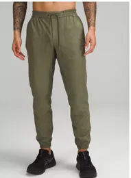 Pantalon pour hommes sports d'extérieur confortable respirant séchable rapide à séchage élastique de pression de pression sans couture décontractée