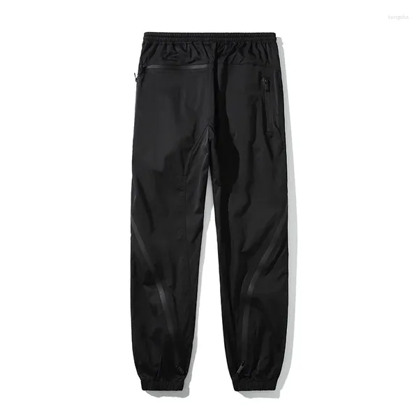 Pantalones para hombres Monos para hombres Nicho Nylon Deconstruido Cremallera High Street Funcional Empalme Leggings Vibe Estilo 2024 Primavera Verano