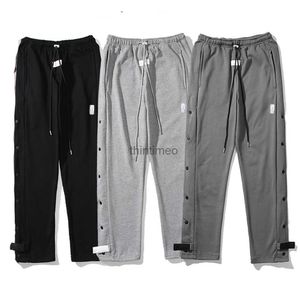 Pantalons pour hommes pantalons hauts pantalons de survêtement à boutons latéraux pantalons de sport Streetwear 240308