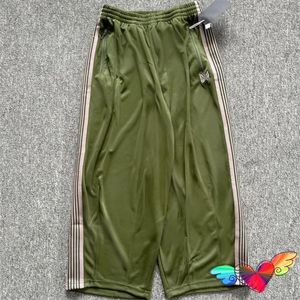 Pantalones para hombres Poly Smooth Green Pink Agujas Ancho Hombres Mujeres 2024 Track AWGE Sweetpants Bordado Mariposa Deporte Pantalón