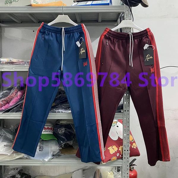 Pantalones para hombres Imagen real Mariposa bordada con bolsillos laterales con cremallera tejida para punto Awge