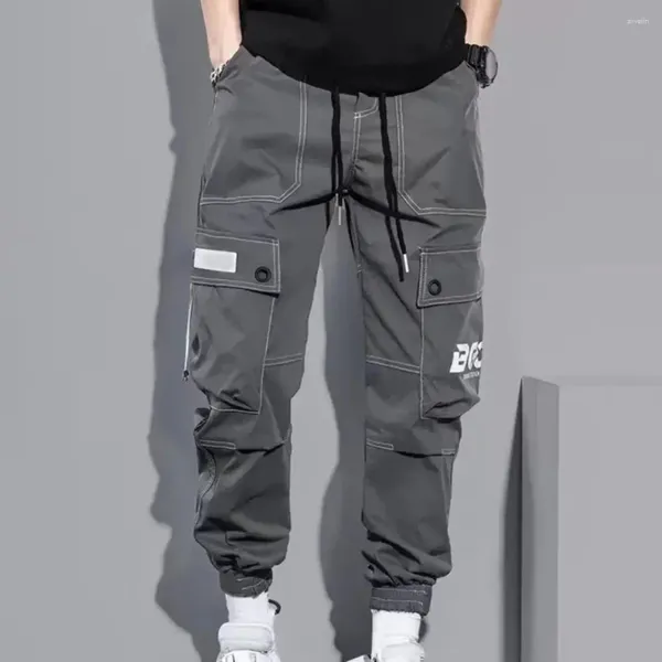 Pantalon masculin sécurisé un pantalon de cargaison de poche avec une taille à cordon de taille multiples conception de bandes de cheville pour les sports quotidiens