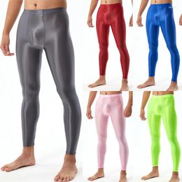 Pantalon pour hommes brillant sexy U convexe bodybuilding brillant serré leggings couleur unie taille moyenne soyeux mode lisse