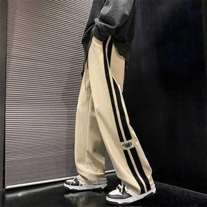 Pantalon pour hommes Side Striped Cordired Lignet Mens 2023 Fashion Hip-hop coréen Pantalon de fret lâche Sports consécutifs Outdoor Runnor Pantl2404