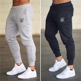 Pantaloni da uomo Sik Jogging Uomo Fitness Jogging Running Training Sport Leggings Abbigliamento sportivo Pantaloni sportivi Bodybuilding Collant 231023