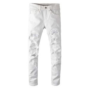 Pantalones para hombres Sokotoo para hombre pantalones vaqueros rasgados con agujeros de cristal blanco pantalones de mezclilla elásticos con diamantes de imitación ajustados a la moda J240330