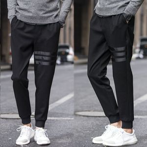Herenbroek solide casual heren joggers vrouwen kaki flodderige broeken gestreepte jongen man slanke mannelijke kleding streetwear m5xl 230107