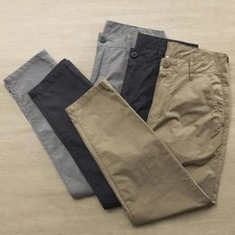 Pantalon pour hommes, couleur unie, décontracté, doux, respirant, neuvième pantalon avec boutons, fermeture éclair, poches pour plus de confort