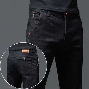 Pantalon masculin couleur Colon Coton noir Jeans gris foncé pantalon masculin classique Slim Stretch Casual Corée Youth Youth Denim Male Male Tableau Y240514