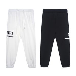 Pantalons pour hommes couleur unie lettre vêtements de rue étiquette pantalons de sport cordon Harajuku surdimensionné pantalon de jogging ample pantalons pour femmes 168