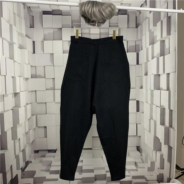 Pantalons pour hommes printemps et automne version coréenne de couleur pure mode all-match bas de gamme Harun Roll Edge jambe radis