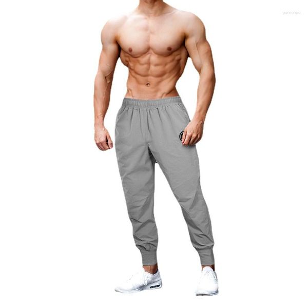 Pantalones de hombre Primavera y otoño Deportes finos Casual Simple Confinado Pie Cuff Impreso Culturismo Entrenamiento Pantalones de chándal