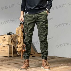 Herenbroeken Lente en herfst trendy Cargobroeken voor heren, slanke leggings, schurken en knappe broeken Amerikaanse multibagbroek outdoor v T240326