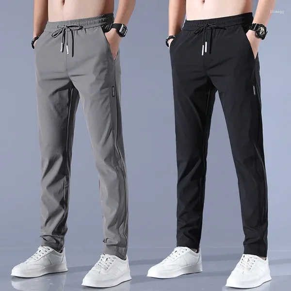 Pantalones para hombres Spring y Summber Casual Ice Seda Versión coreana Corea Tendencia de moda