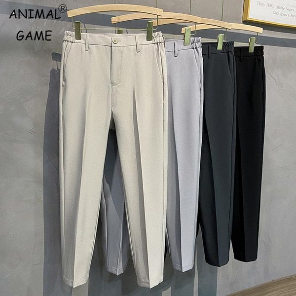 Pantalones de hombres traje casual de primavera pantalón de ajuste delgado trabajo de cintura elástica pantalones de jogging verano macho negros negros grande talla grande 42