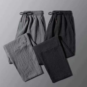 Pantalon masculin printemps / été / automne Nouveau pantalon décontracté en lin ultra mince pantalon de sport