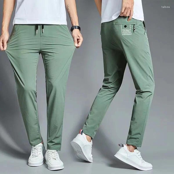 Pantalon masculin printemps été hommes minces contradits consécutifs légers décontractés minces de glace élastique.