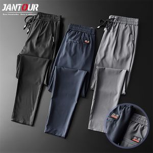 Herenbroek lente zomer mager casual jogging outdoor lading slank klassieke kleding zwart grijs dunne fast droge broek man 38 220826