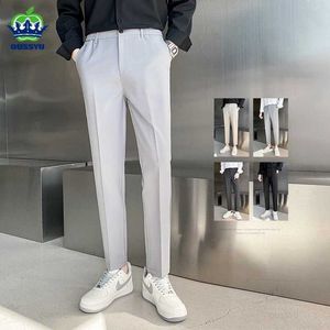 Herenbroeken lente zomer pak broek mannen rekken zakelijke elastische taille slanke enkel lengte broek Koreaanse broek mannelijk groot formaat 40 42 y240514