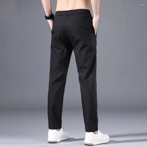 Los pantalones para hombre se mantienen cómodos y a la moda con estos pantalones chinos Slim FIT para hombre, ideales para uso diario en el negocio