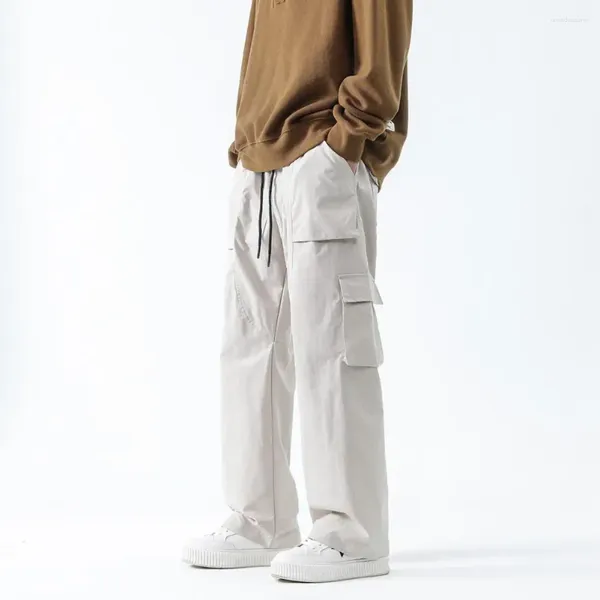 Pantalon pour hommes à cordon de cordon élastique droit de taille de taille de taille avec des poches solides pour le streetwear