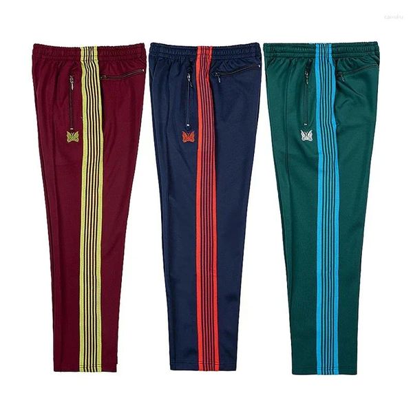 Pantalones para hombres Agujas de ropa de calle Mujeres StriPes multicolores Awge Awge Trackpant Borded Butfly Logo Pantalones