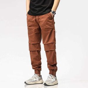 Herenbroeken Streetwear Safari -stijl broek in de zomer Full Color Mens kleding Fashion Pocket Patch Workday Loose Casual PantsL2405