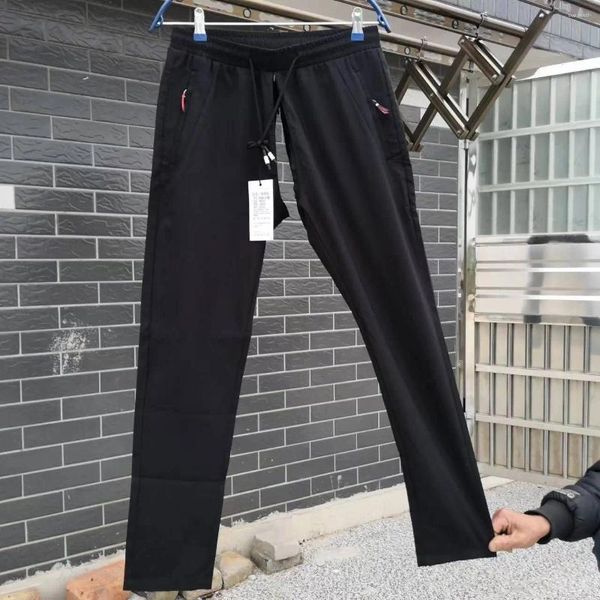 Pantalones para hombres Verano Casual Seda de hielo Pantalones transpirables Cremallera invisible Asiento abierto Hombres sexuales Conveniente Carga holgada