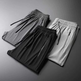 Pantalons pour hommes Été décontracté hommes taille élastique ultra-mince soie glacée froid noir gris pantalon mince élastique lisse Lyocell tissu pantalon pantalon de sport J240328