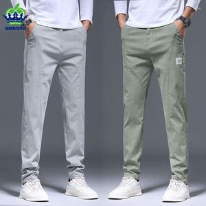 Pantalones de hombre de verano de algodón elástico coreano Casual Slim Fit cintura elástica Jogger pantalones clásicos de negocios hombre verde claro gris 38