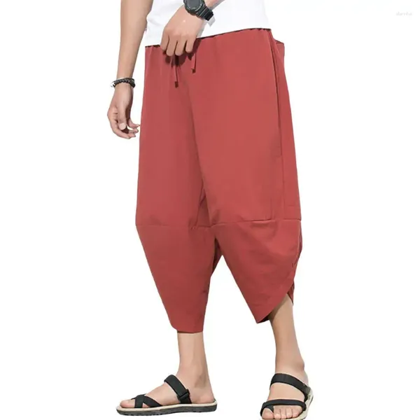 Pantalones para hombres hombres de verano sueltos de mediana longitud múltiples múltiples estilo japonés Irregular Profunda de la entrepierna Harema casual pantalones