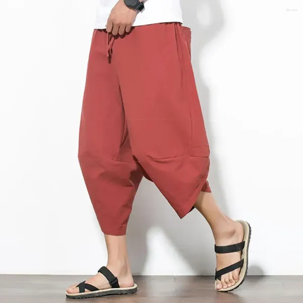 Pantalones para hombres hombres de verano hombres sueltos de mediana calificación múltiples bolsas de color puro estilo japonés japonés entrepierna