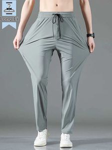 Pantalon masculin pour hommes zipper de poche pantalon sportif respirant pantalon de pantalon décontracté en nylon élastique élastique grande taille 8xll2405