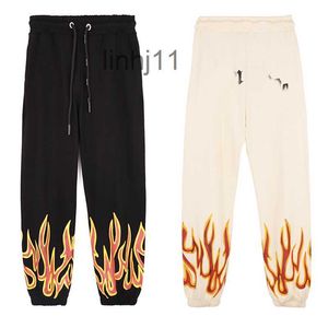 Pantalons pour hommes Tech Fleece Designer Palm Mens Flame Graffiti Print Loose Slacks Jogging Pantalons de survêtementZ08T