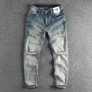Pantalons pour hommes Les nouveaux trous en automne ont été lavés, permettant aux vieux jeans pour hommes de porter des pantalons à fermeture éclair à couture latérale à la mode J240328