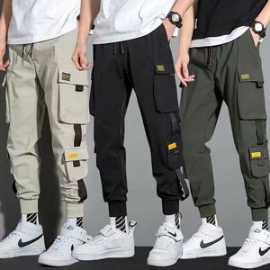 Herenbroek dunne streetwear casual mannen linten harem joggen mannelijke slanke fit veer vracht multipocket broek jx1 230406