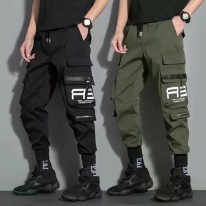 Pantalons pour hommes Mince Streetwear Pantalons décontractés Hommes Rubans Harem Pantalon de Jogging Mâle Slim Fit Printemps Pantalon Cargo Multi-poches Femmes Pantalon J9 231129