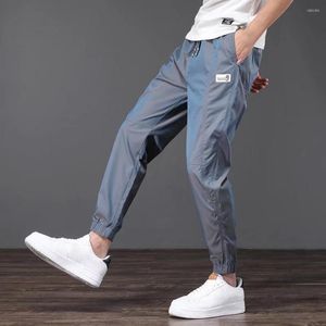 Pantalones para hombres finos y elegantes con levantamiento de cadera y tobillo atado, carga de verano, cambio de color para la escuela