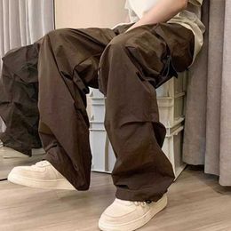 Pantalon masculin pantalon pantalon de cargaison pour hommes de style rue avec plusieurs poches pour une ajustement lâche adapté à la mode hip-hop et à l'usure confortable.Fittingl2405 en vrac