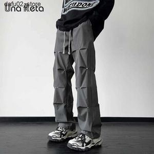 Pantalon masculin una reta 2024 Nouveau pantalon pour hommes harajuku hip hop rivet conception produit pour hommes pantalon sportif y2k pantalon sportif pantalon Q240417
