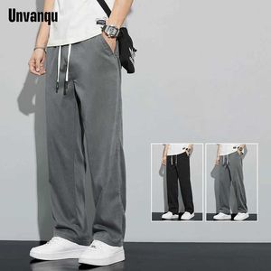 Pantalon masculin unvanqu 2024 printemps / été nouveau pantalon à jambes larges tencel pour hommes simples