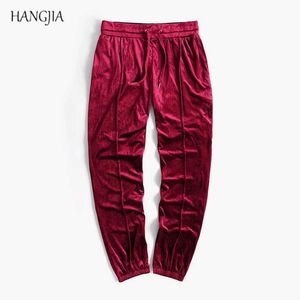 Pantalon masculin en velours pantalon de jogging en vrac vêtements de rue ajustement rouges pantalon de sport gris surdimensionné surdimensionné en velours.