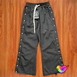 Pantalons pour hommes cirés Hellstar Tag Pantalons de survêtement Hommes Femmes Path To Paradise Long Cordon Jogger Nylon Bouton Pantalon 231114