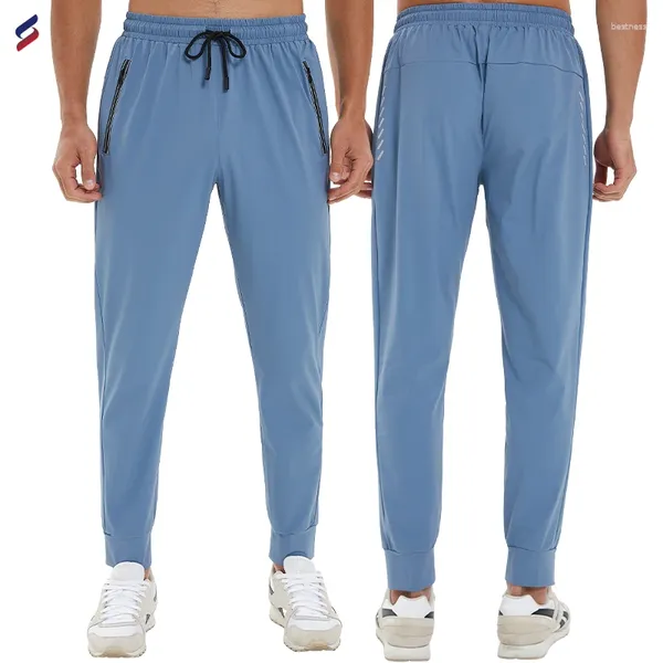 Pantalones para hombres al por mayor de poliéster casual logo impreso joggers corriendo gimnasia cintura elástica pantalones de chándal en blanco pantalones para hombres c657