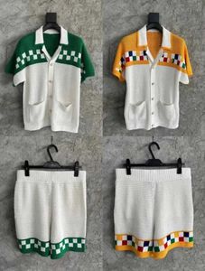 Marque de mode masculine Jacquard Plaid Broidered Pattern Sweater Sweater Short Shirts à manches courtes Men de femme Suisse Femmes Q240508