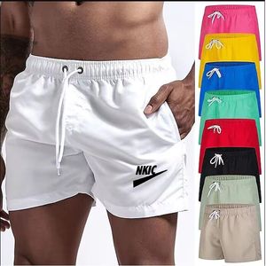 Shorts respirants secs rapides masculins Nouveaux couleurs une couleur unie sportive pantalon décontracté d'été shorts de mode d'été Impression