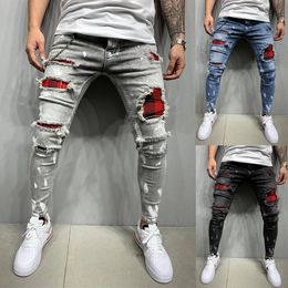 Panneau de vêtements de rue rétro pour hommes Torn pantalon de jean décontracté à la fermeture à glissière populaire en Europe et en Amérique 231222